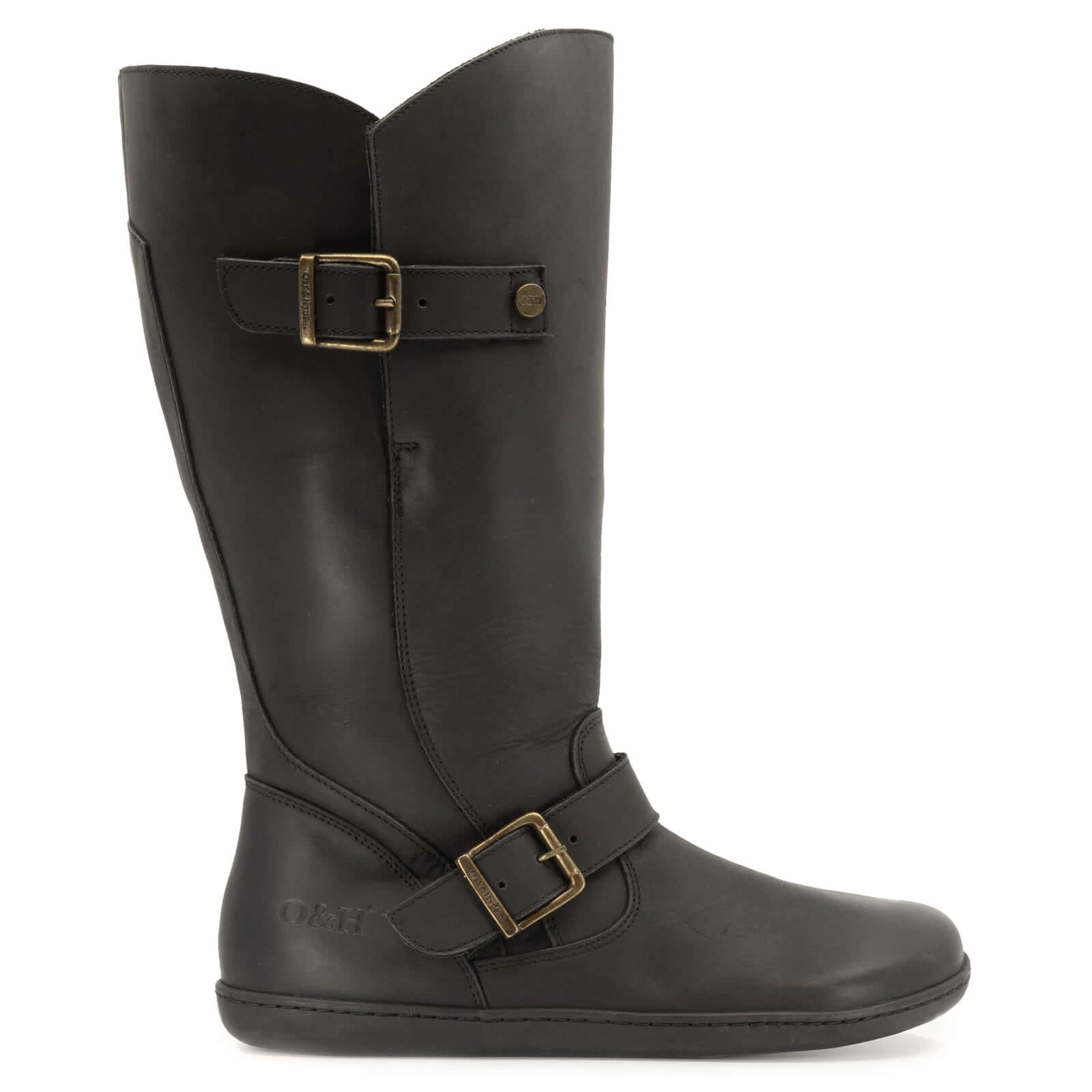 side view of black wide calf barefoot boots showing buckle detailing on white background