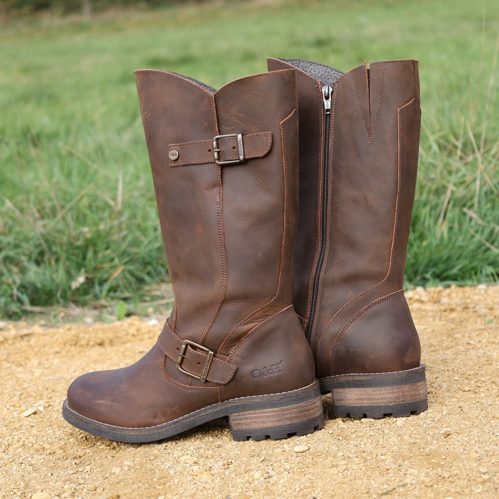 Dark brown Crest 2 tall boots worn outdoors standing on compact ground