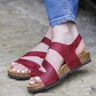 red oak & hyde daisy sandals worn outdoors showing open toe straps and cork footbed