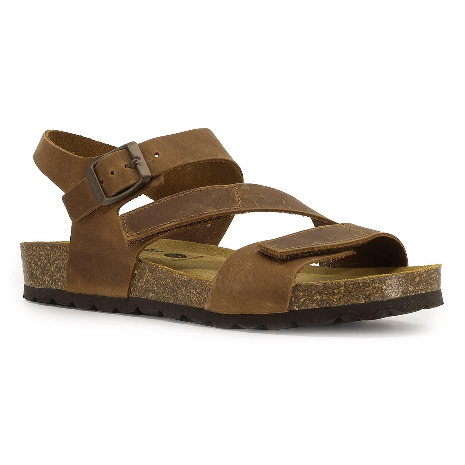 angled front view of tan oak & hyde daisy sandals showing open toe straps and adjustable ankle buckle