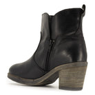 inside angled view of Eastside black ankle boots showing inside zip and leather upper