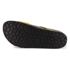 outsole of lemon oak & hyde ebony sandals showing textured tread pattern