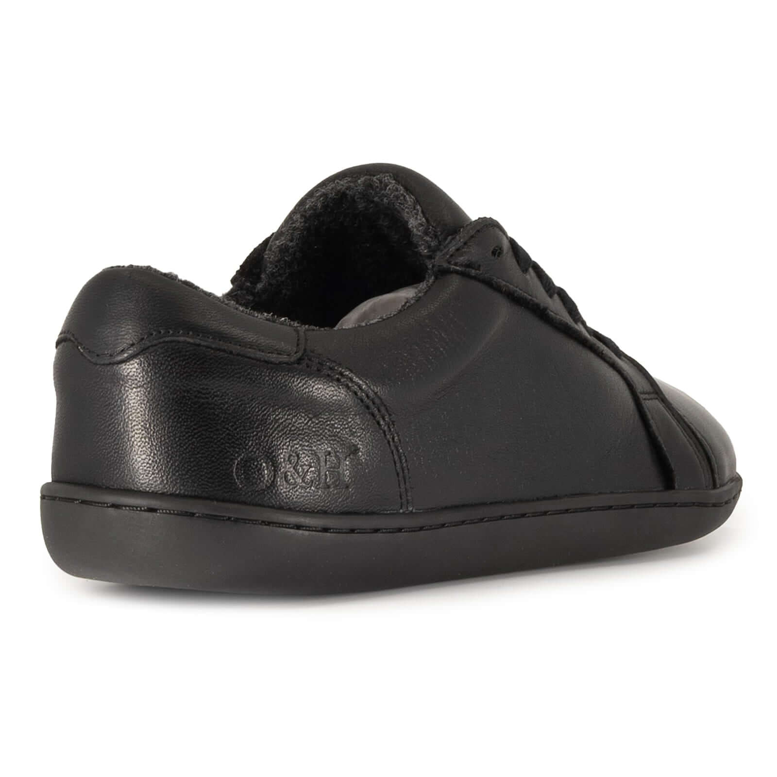 O&H logo on heel of black barefoot trainers on white background