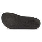 zero drop outsole of black barefoot trainers showing tread pattern