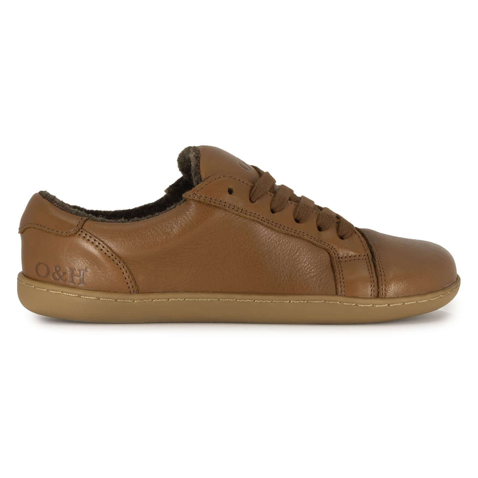 brown leather barefoot trainers side on view on white background