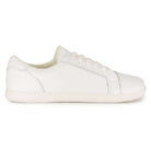 side angle of white barefoot trainers showing panel detailing on white background
