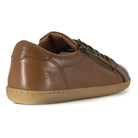 view of outside heel of tan barefoot trainers showing O&H logo on white background