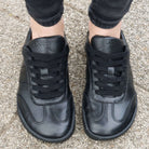 model wearing juniper all black trainers birds eye view showing toe box shape