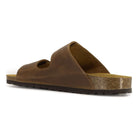 side view of tan oak & hyde lily adjustable sandals showing leather upper and cork midsole