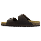 Side view of dark brown leather fisherman sandal showing smooth leather upper and cork footbed