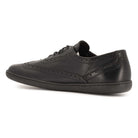 inside angled view of maple barefoot brogue shoes in black showing brogue panel detail
