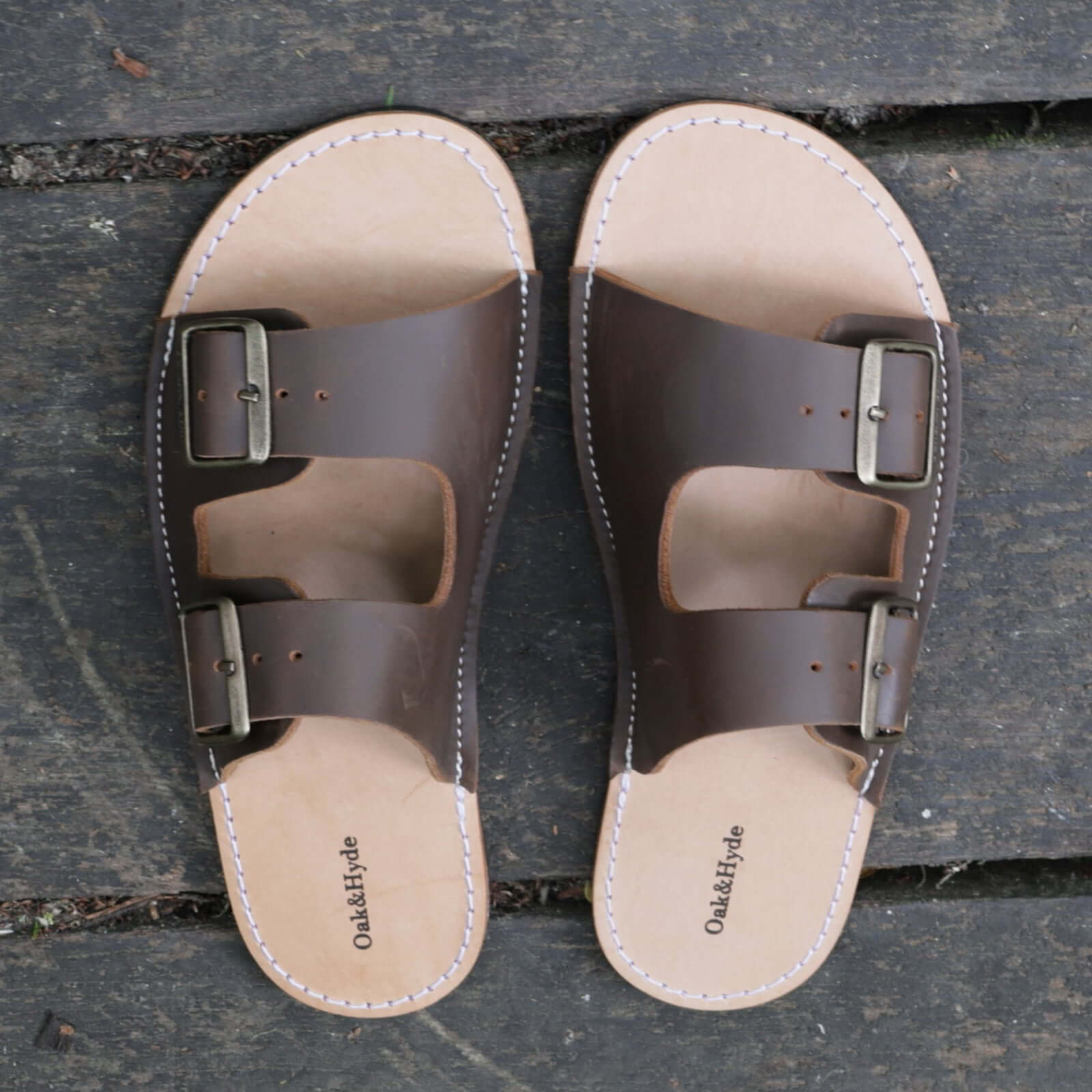 birds eye view of mens acacia barefoot sandals in dark brown showing the toe box shape