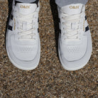 top down view of mens larch barefoot trainers in white navy showing toe box shape