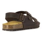 rear angle view of dark brown oak & hyde malaga back strap sandals showing adjustable heel strap and cork sole