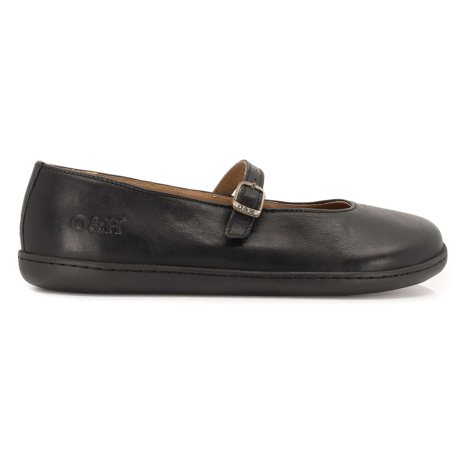 Side profile view of Olive barefoot mary jane shoes in black showing leather upper