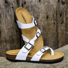 pair of savannah 2 white sandals showing style in an outdoor setting