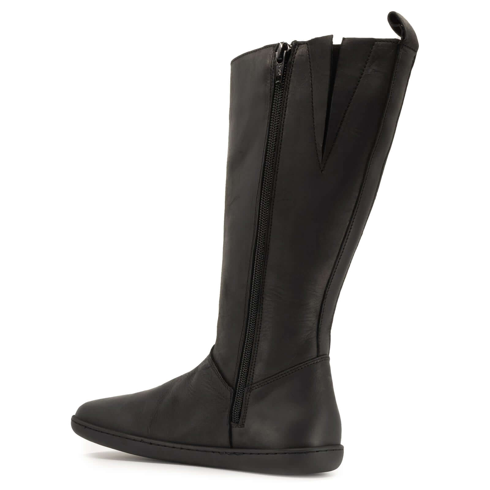 inside zip view of black barefoot boots on white background