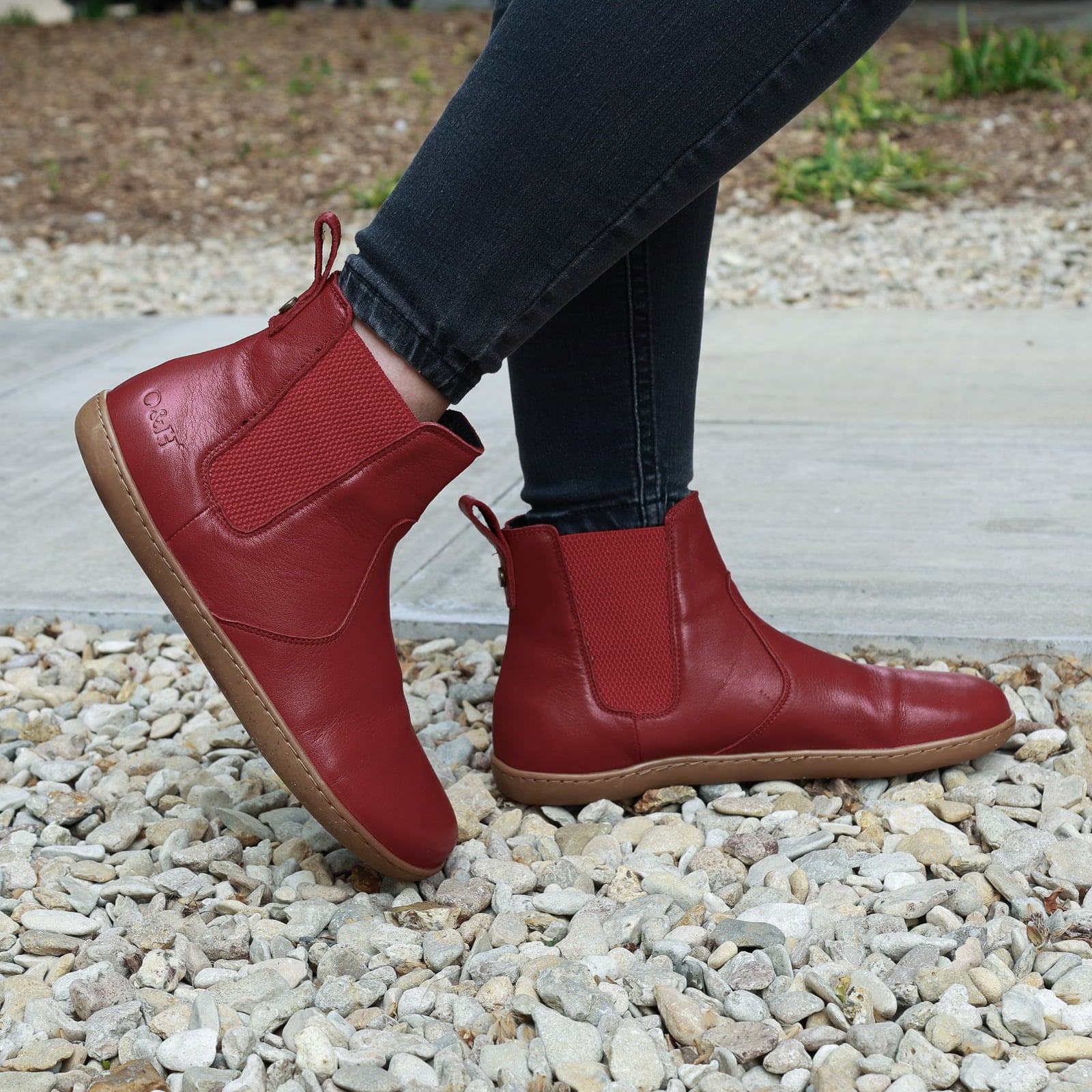 model standing outdoors in willow 2 barefoot chelsea boots in red