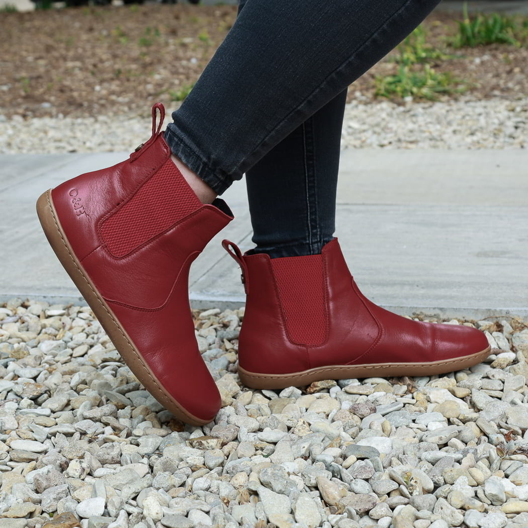 model standing outdoors in willow 2 barefoot chelsea boots in red