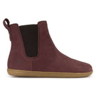 side profile view of willow zip barefoot boots in wine showing nubuck leather upper