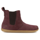 side profile view of willow zip barefoot boots in wine showing nubuck leather upper
