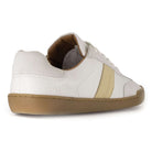 heel view of white barefoot trainers showing O&H embossed logo on  a white background