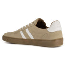 inside angled view of womens larch barefoot trainers in beige showing heel logo detail